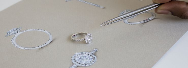 Gouache art and diamond selection round diamond halo engagement ring