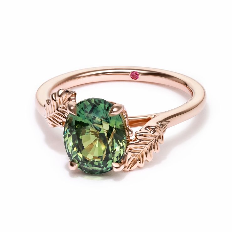 Bi colour yellowish-green oval sapphire nature inspired engagement ring with leaf engraving