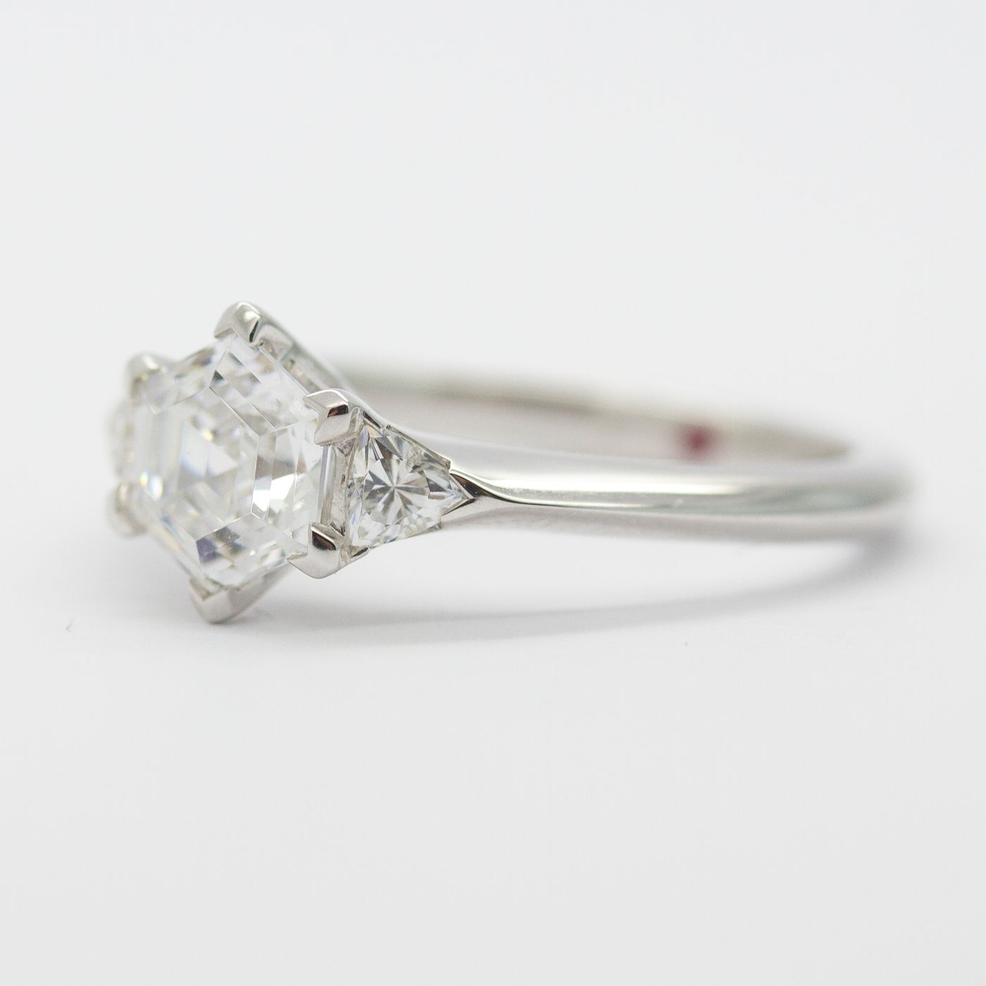 Hexagon centre diamond with trilliant side diamonds