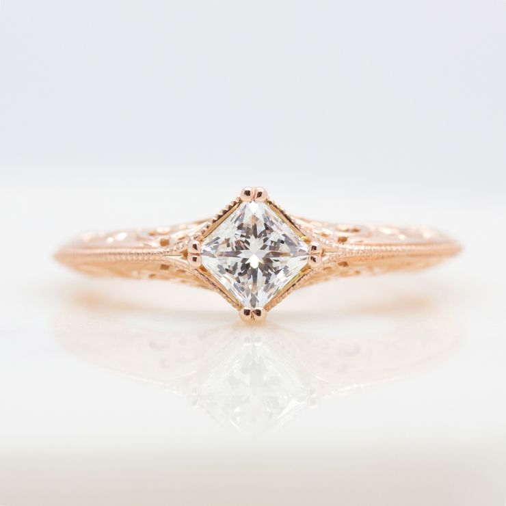 Princess cut diamond engagement ring with filigree and milgrain detail