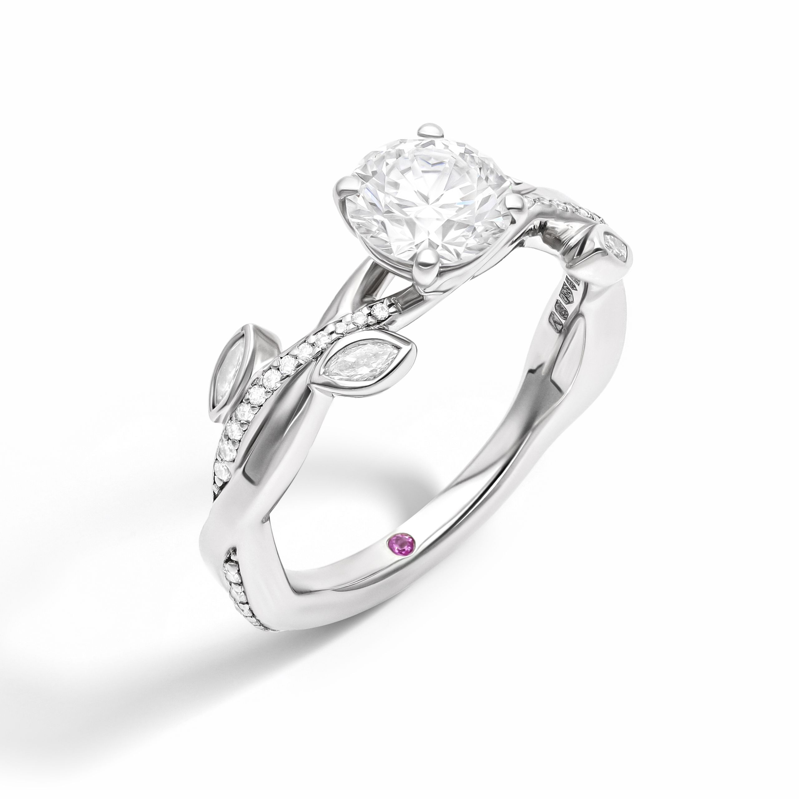 Round diamond organic engagement ring with marquise diamond bezel set leaves