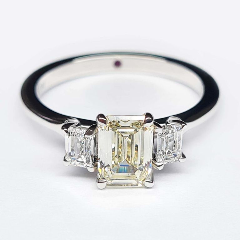 Emerald cut diamond trilogy ring