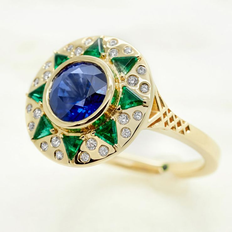 Blue round sapphire emerald diamond halo yellow gold engagement ring