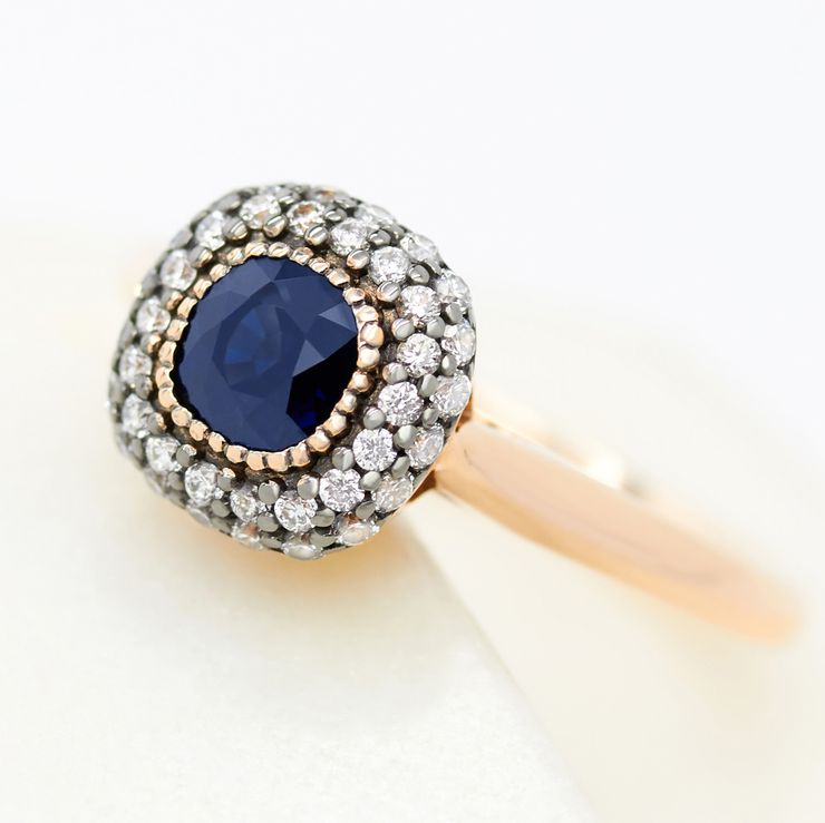 Cushion cut blue sapphire rose gold engagement ring with double diamond rhodium plated halo