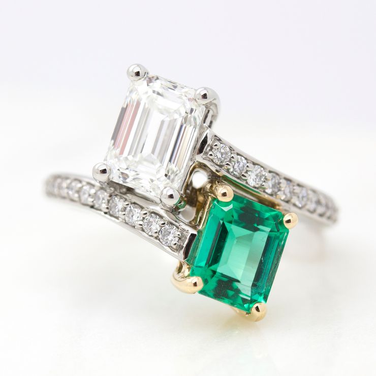 Vintage inspired emerald cut diamond and emerald 'moi et toi' engagement ring