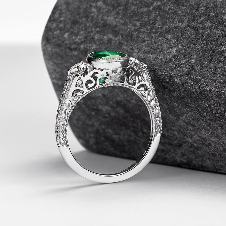 Emerald engagement ring with vintage filigree and hand engraved detail