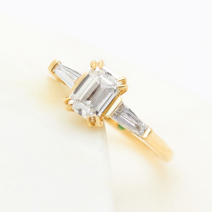 Emerald cut diamond custom cut baguette accent stones