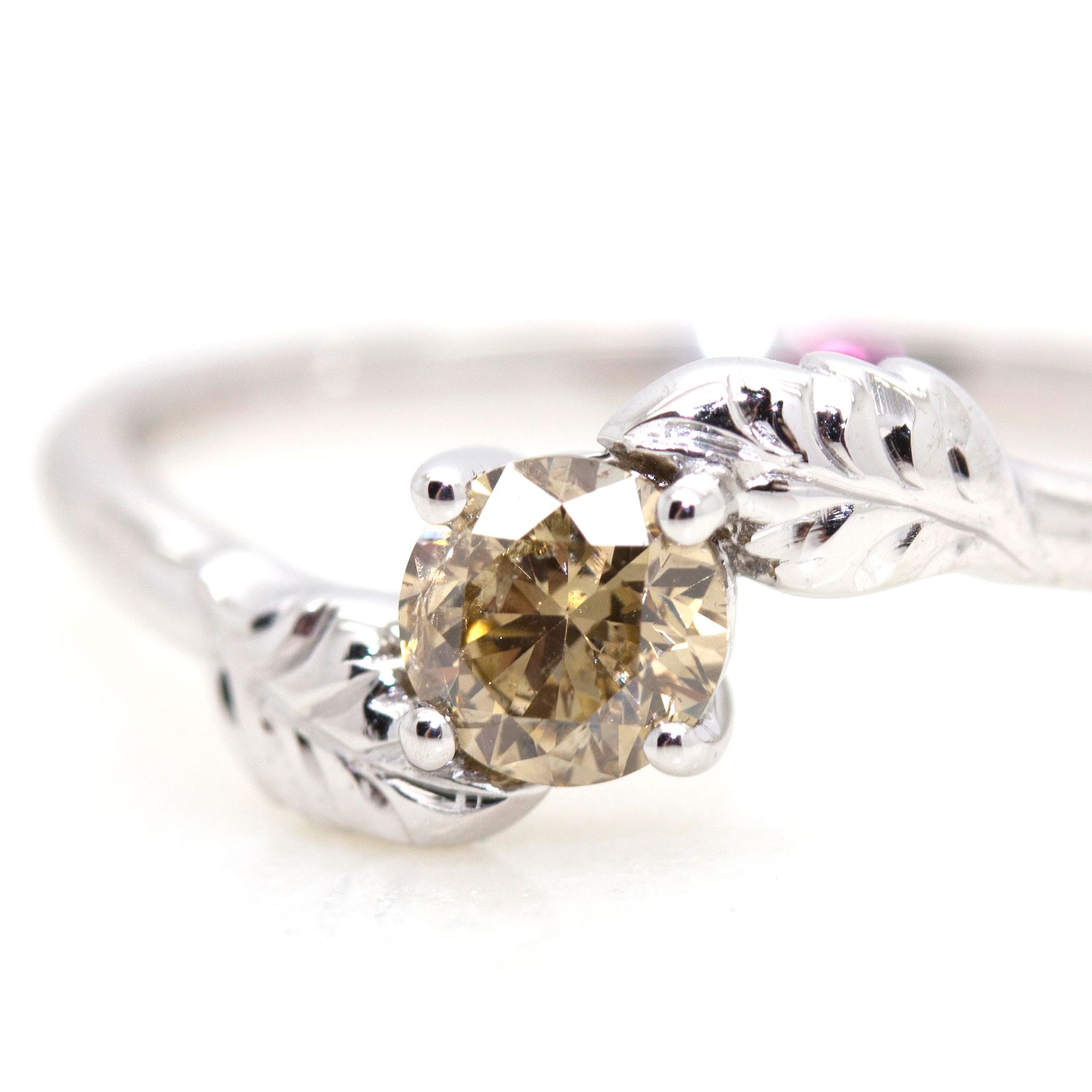 Fancy brown round diamond with leaf engraving on platinum band