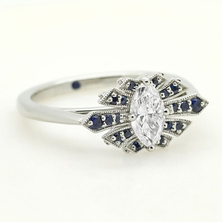 Vintage inspired marquise diamond with blue sapphire milgrain fan