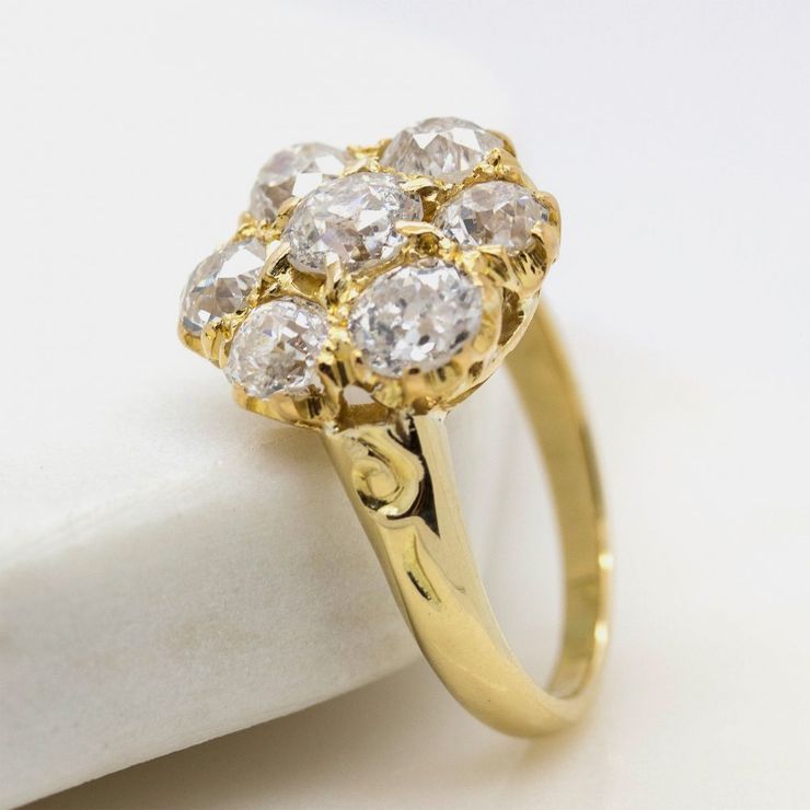 Old european cut diamond cluster ring side view