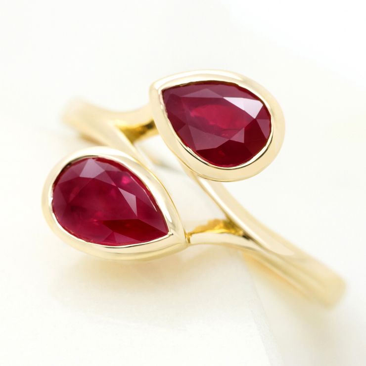 Pear shape ruby moi et toi yellow gold engagement ring