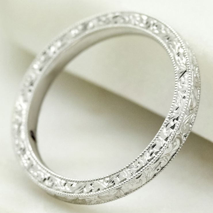 Platinum wedding band with engraving and milgrain