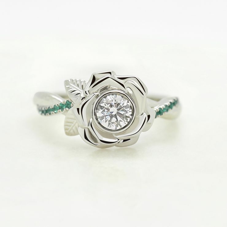 Platinum flower round diamond engagement ring emerald pavé
