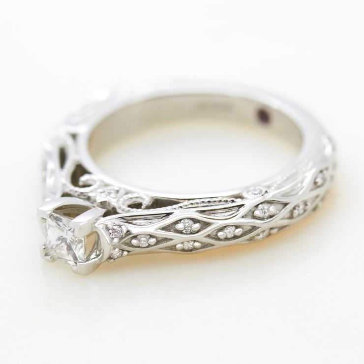 Princess diamond vintage engagement ring with lattice structure and bead set diamonds