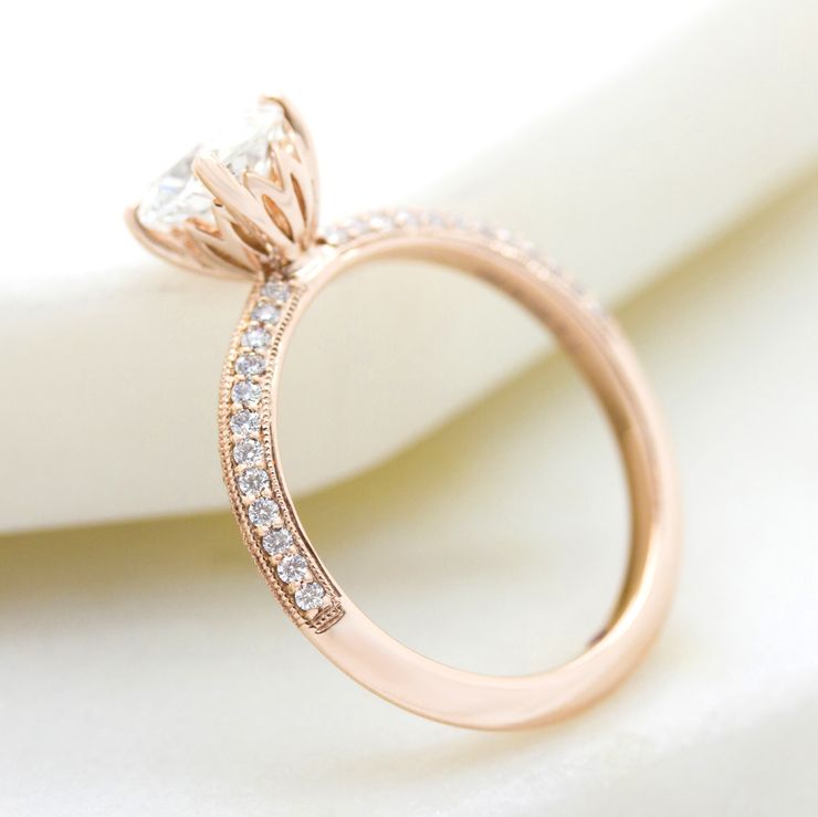 Rose gold knife edge engagement ring with milgrain and floral inspired basket