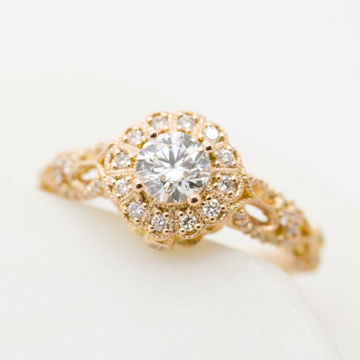 Rose gold milgrain and filigree diamond halo engagement ring