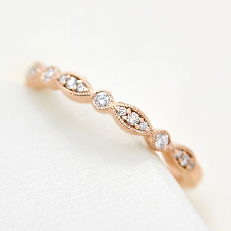 Vintage inspired round diamond wedding band with milgrain