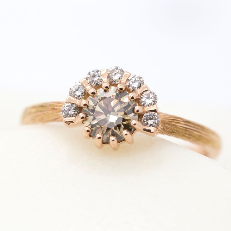 Round fancy yellowish brown diamond with half diamond halo and wire brushed rose gold finish