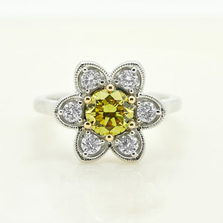 Yellow sapphire floral design round diamonds platinum