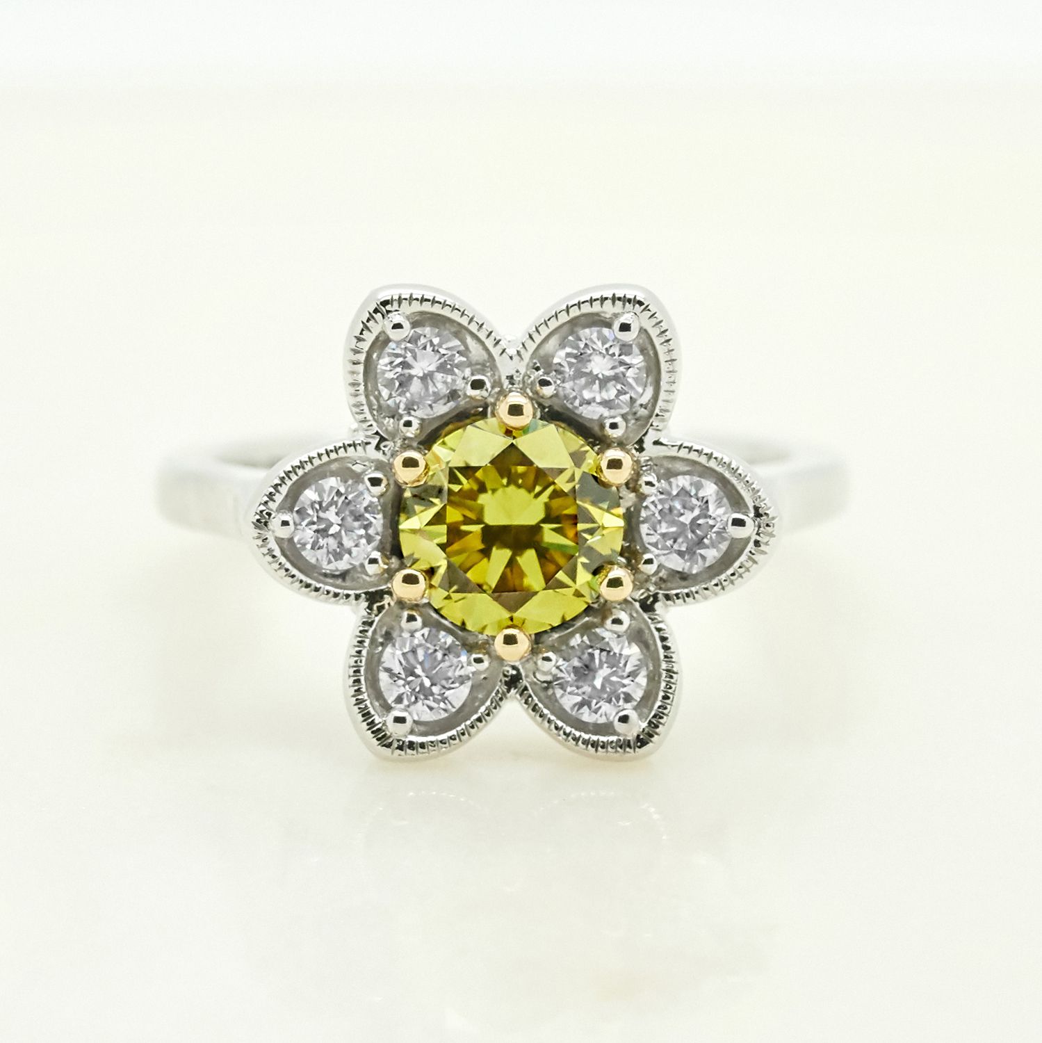 Yellow sapphire floral design round diamonds platinum