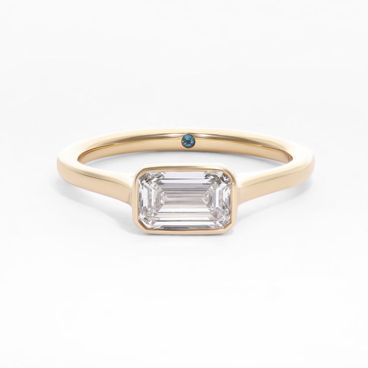 East west bezel set emerald diamond engagement ring yellow gold copy