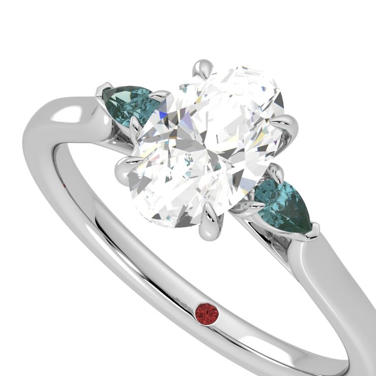 Oval trilogy with colourful side stones