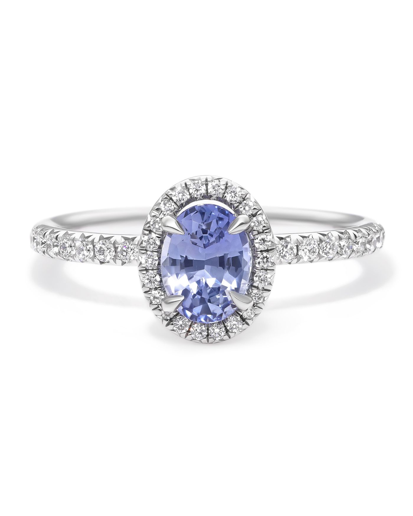 Light blue oval sapphire diamond halo engagement ring