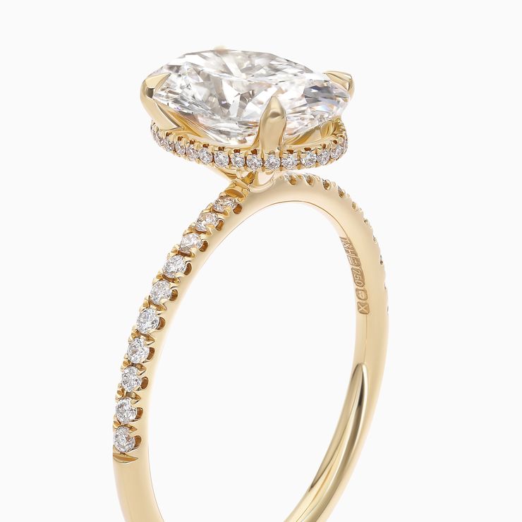 Oval diamond hidden halo engagement ring yellow gold copy