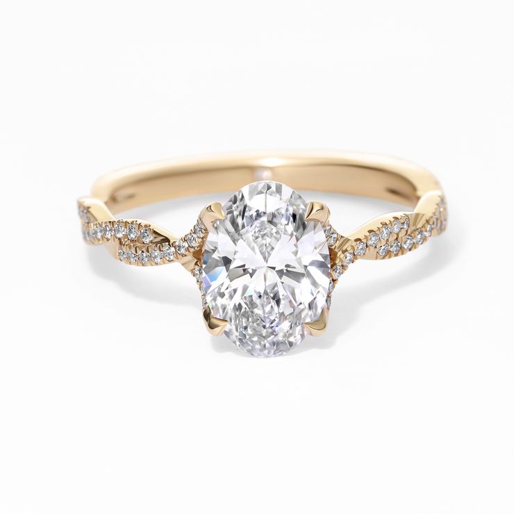 Twisted yellow gold oval diamond engagement ring sq