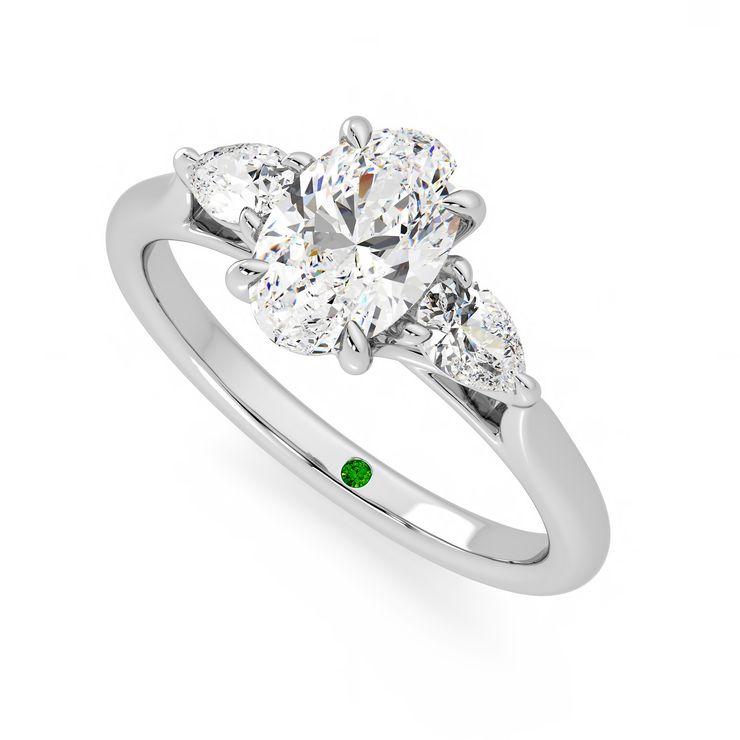 Affinity oval green emerald signature stone