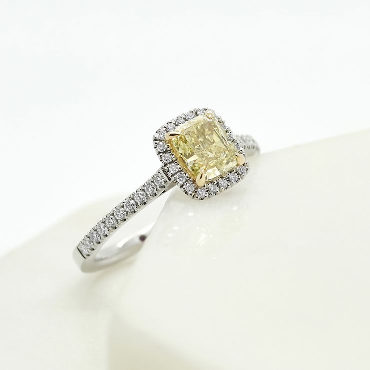 Cushion cut yellow diamond engagement ring