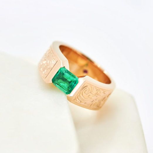 Rose gold and emerald mens engagement ring