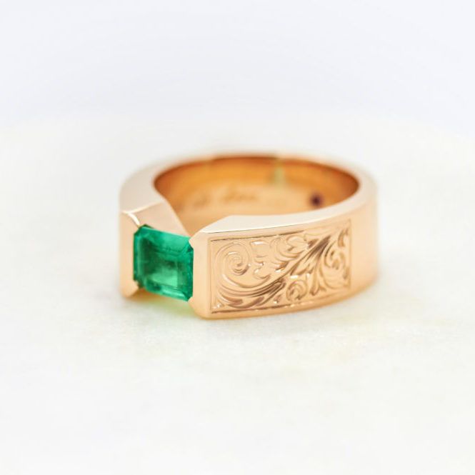 Rose gold and emerald mens engagement ring
