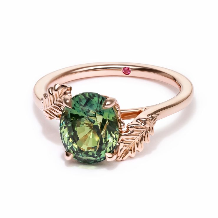 Bicolour yellow green oval sapphire nature organic inspired engagement ring with leaf engraved accent rose gold band