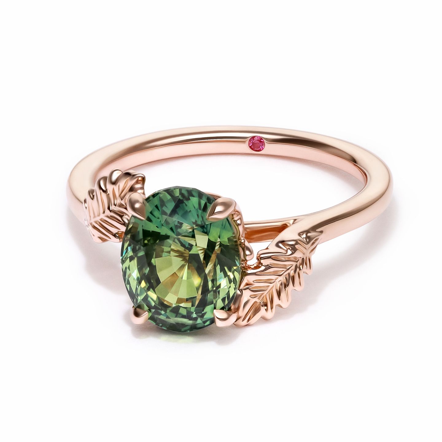 Bicolour yellow green oval sapphire nature organic inspired engagement ring with leaf engraved accent rose gold band