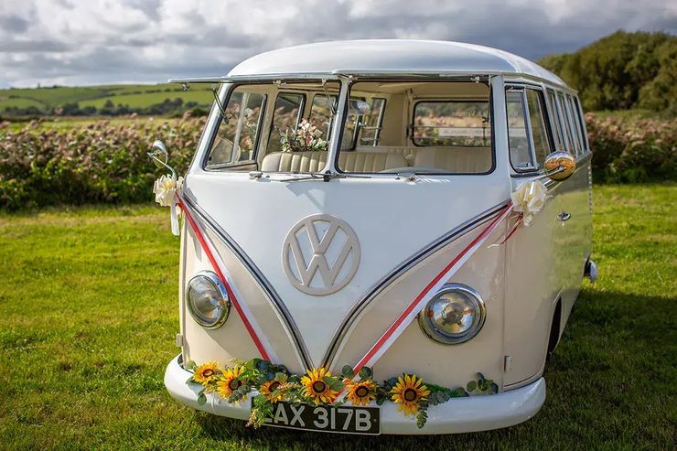 Cream vintage campervan wedding transport