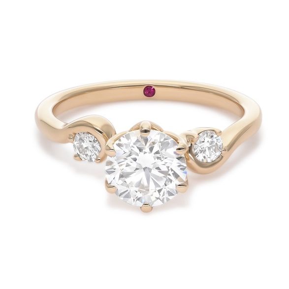 Round accent stones engagement ring with swirl details