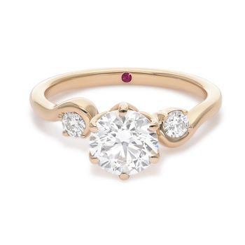 Round accent stones engagement ring with swirl details