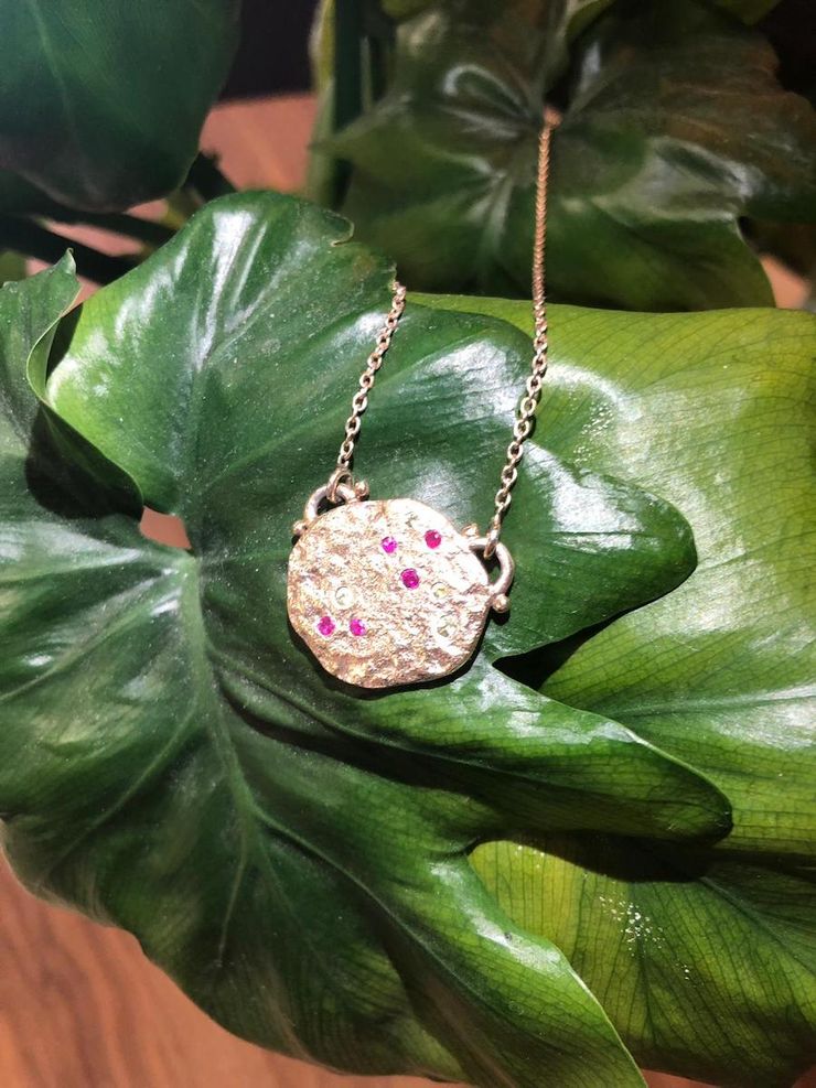 Hammered yellow gold pendant by Deci London