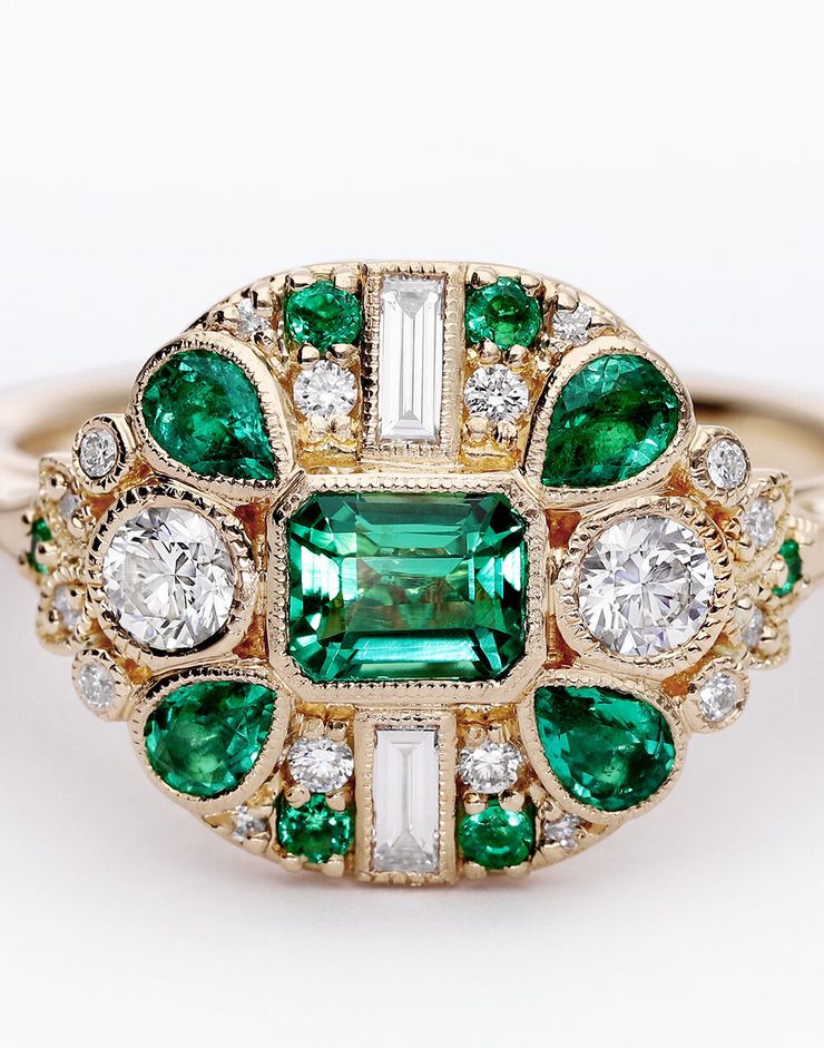 Bespoke emerald and diamond vintage inspired yellow gold engagement ring