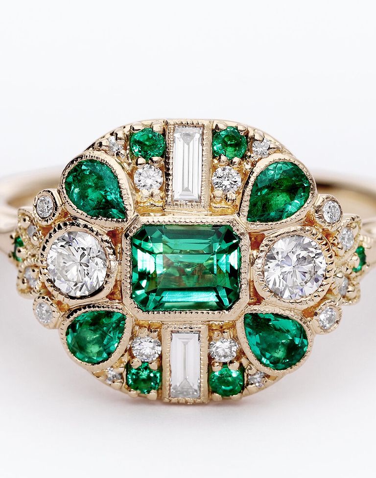 Bespoke emerald and diamond vintage inspired yellow gold engagement ring