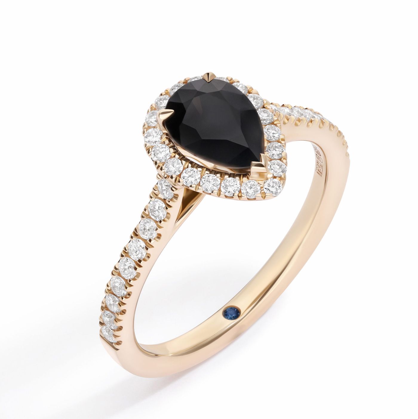 Pear black diamond halo engagement ring yellow gold