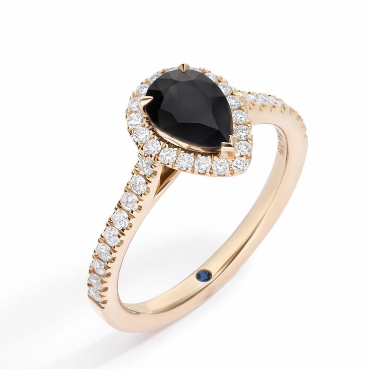 Pear black diamond halo engagement ring yellow gold