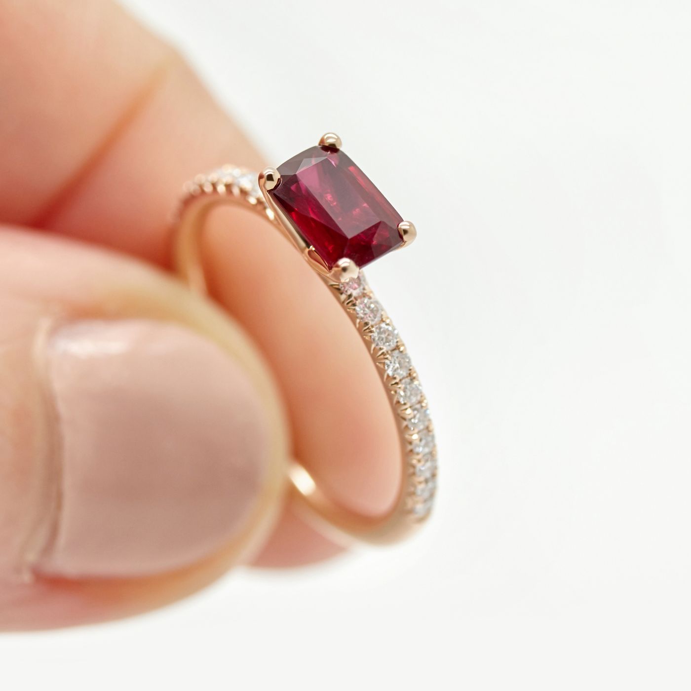 Ruby emerald cut rose gold engagement ring