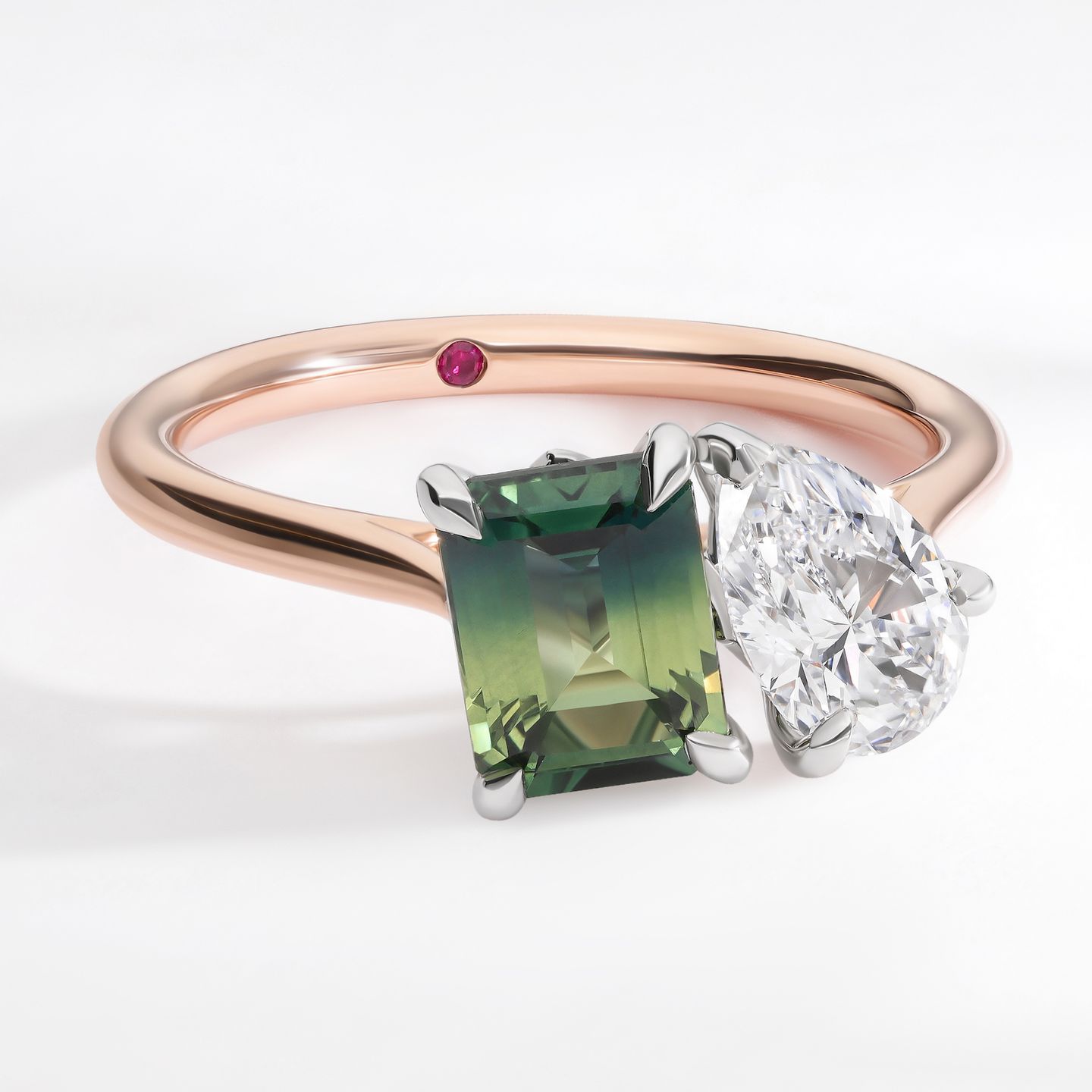 Customised turelle bi colour emerald cut sapphire with pear diamond Toi et Moi engagement ring mixed metal platinum rose gold 2 square
