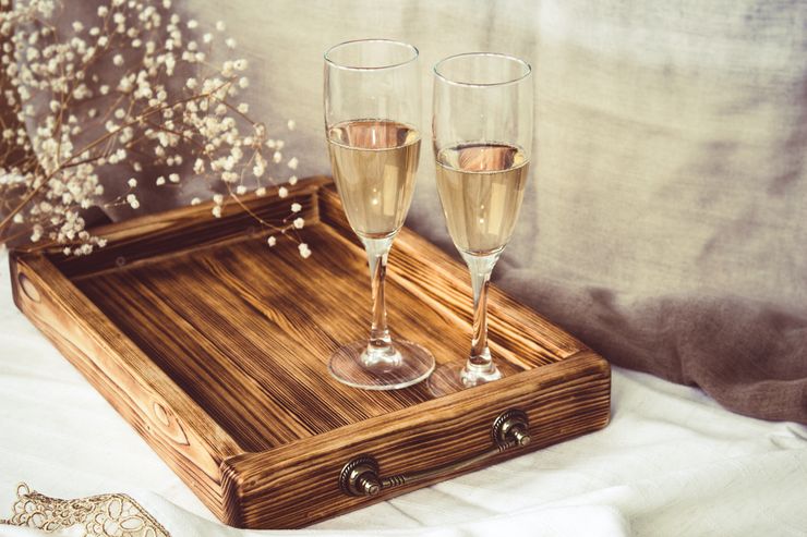 Pair Of Champagne Flutes Wine Glasses and Wooden Tray On