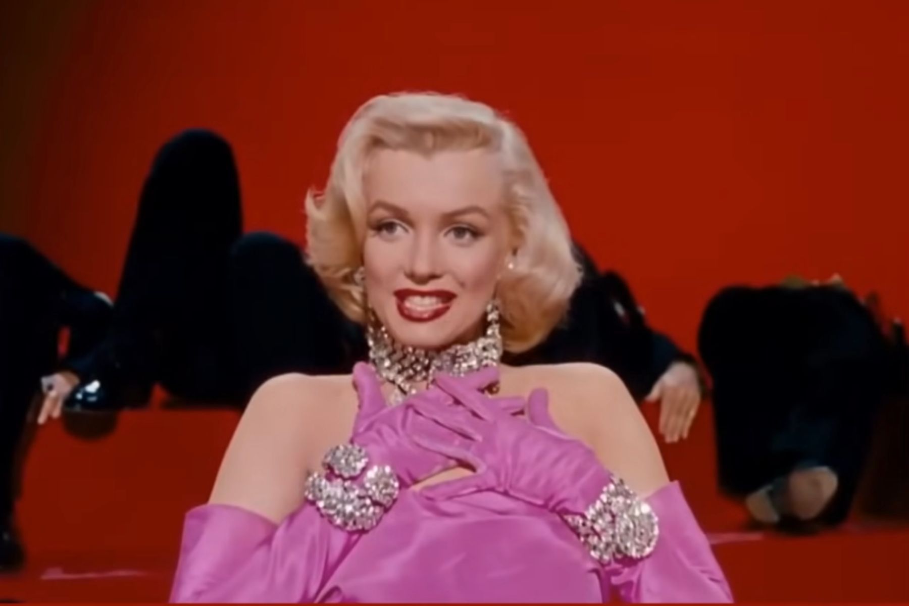 Classic Hollywood glamour scene with diamond jewelry