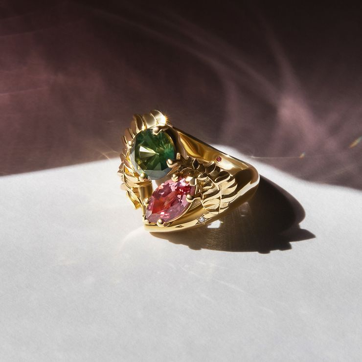 Fern cosmos design featuring fern engraved yellow gold framing