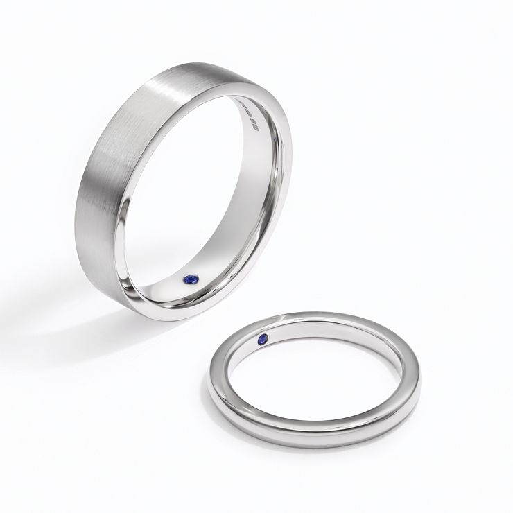 Matching couples polished wedding ring set blue sapphire signature stone