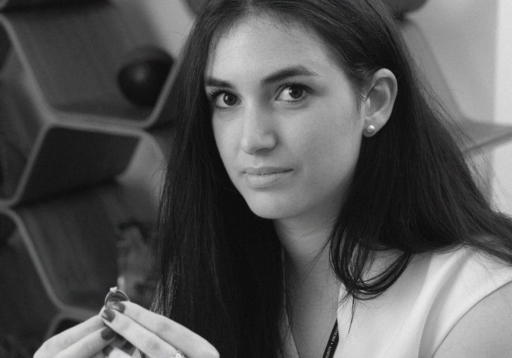 Portrait of jewellery consultant in studio setting